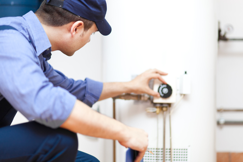Plumber,Repairing,An,Hot-water,Heater